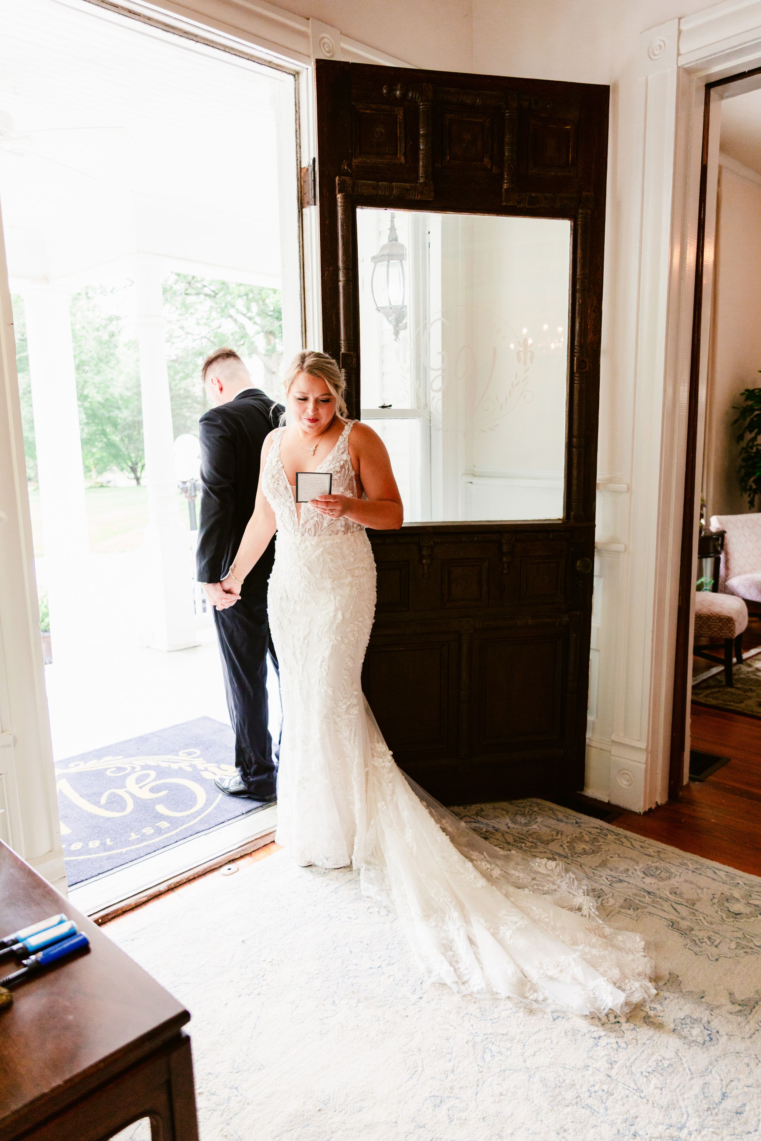 A series of four wedding dress photos showing a bride in a lace gown being fitted and photographed in a sunlit room.