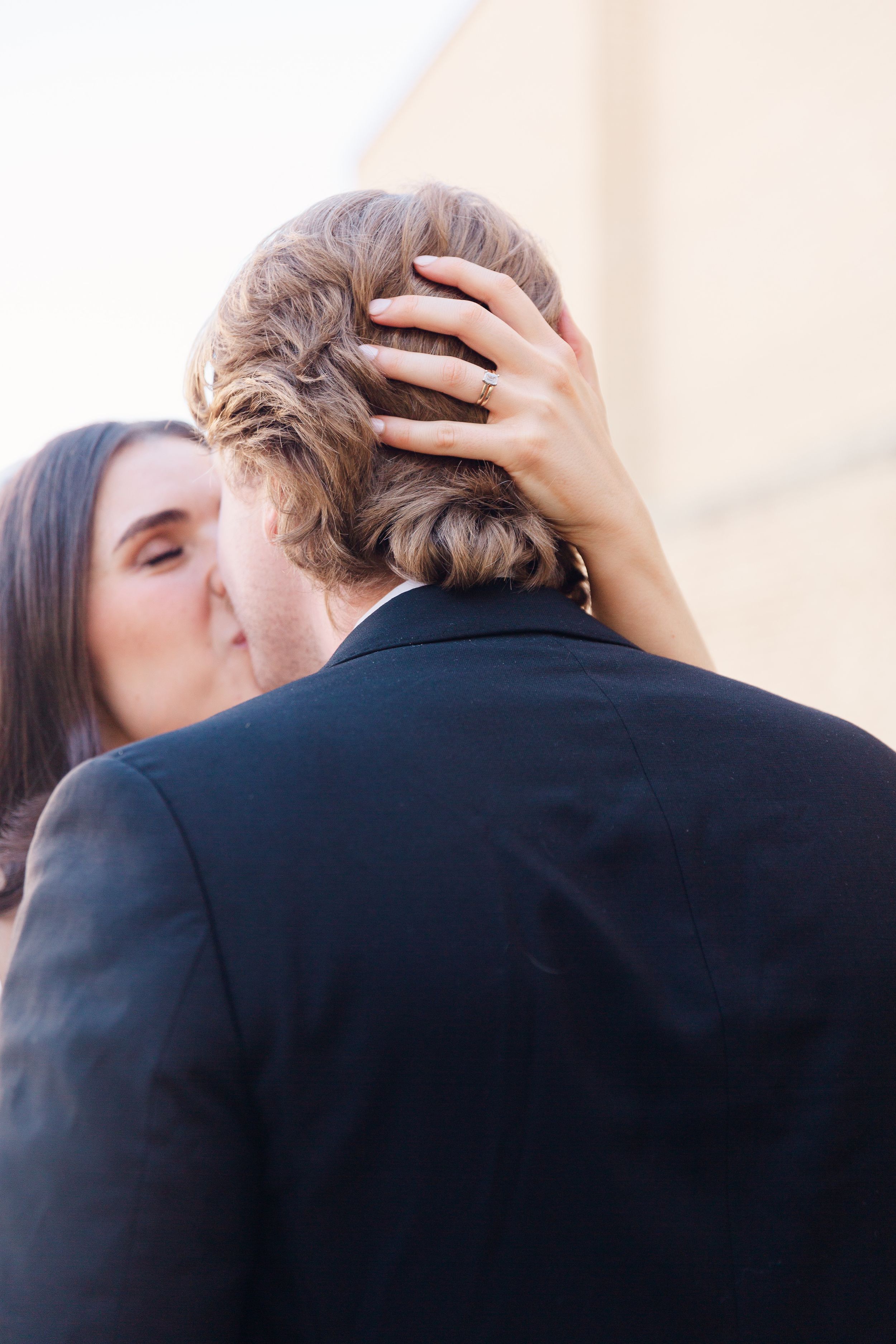 An intimate moment captured between newlyweds during their wedding photoshoot.